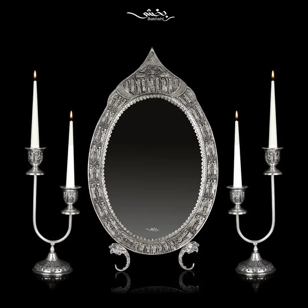 ست آینه بیضی تاجدار و شمعدان نقره دوشاخه تخت جمشیدست آینه بیضی تاجدار و شمعدان نقره دوشاخه تخت جمشید
