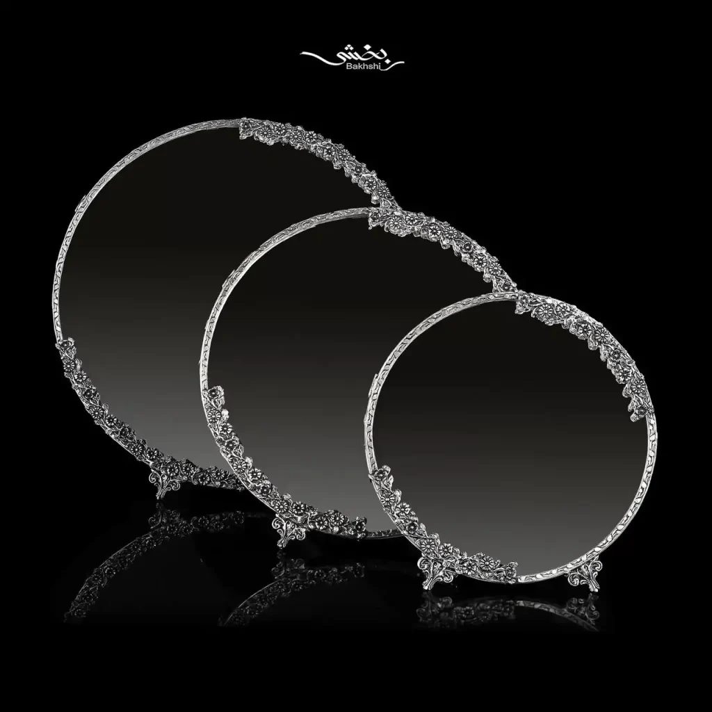 آینه نقره گرد شکوفه مدرن در سه سایز مختلف و ساخته شده از نقره با عیار 92.5 موجود در شعب حضوری و سایت نقره بخشی.